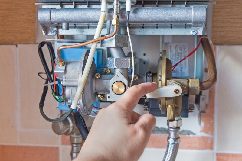 Plumbing and heating work in a West Horsley property